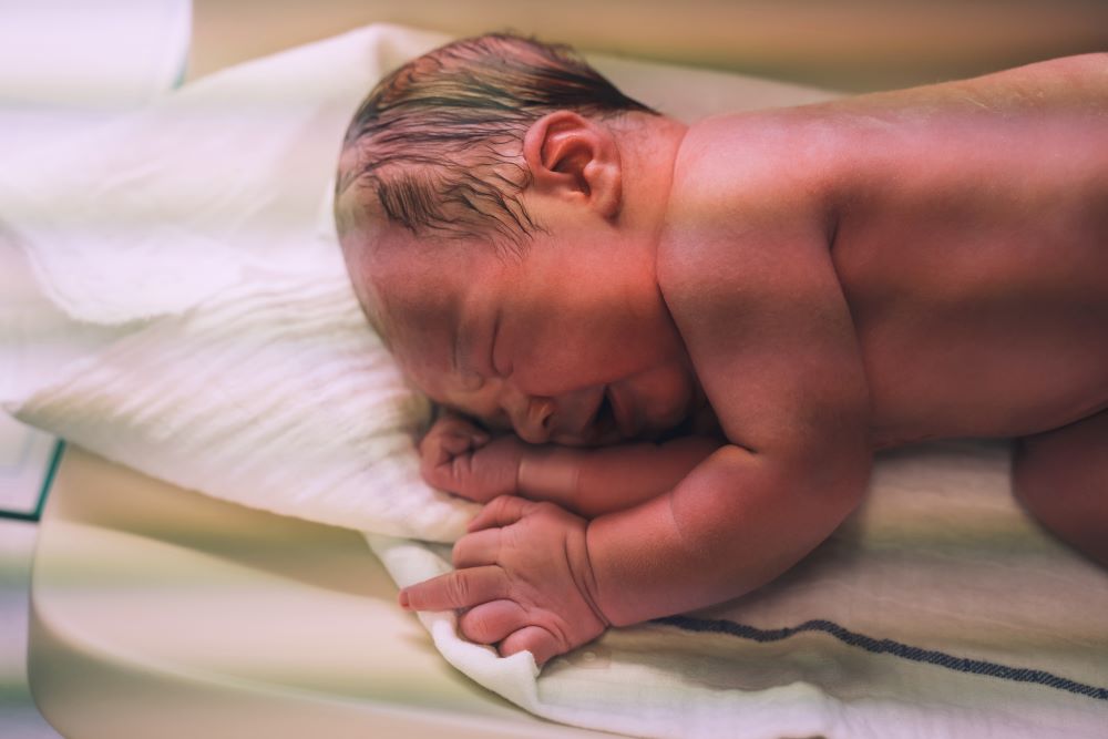 Newborn baby after delivery in labor room
